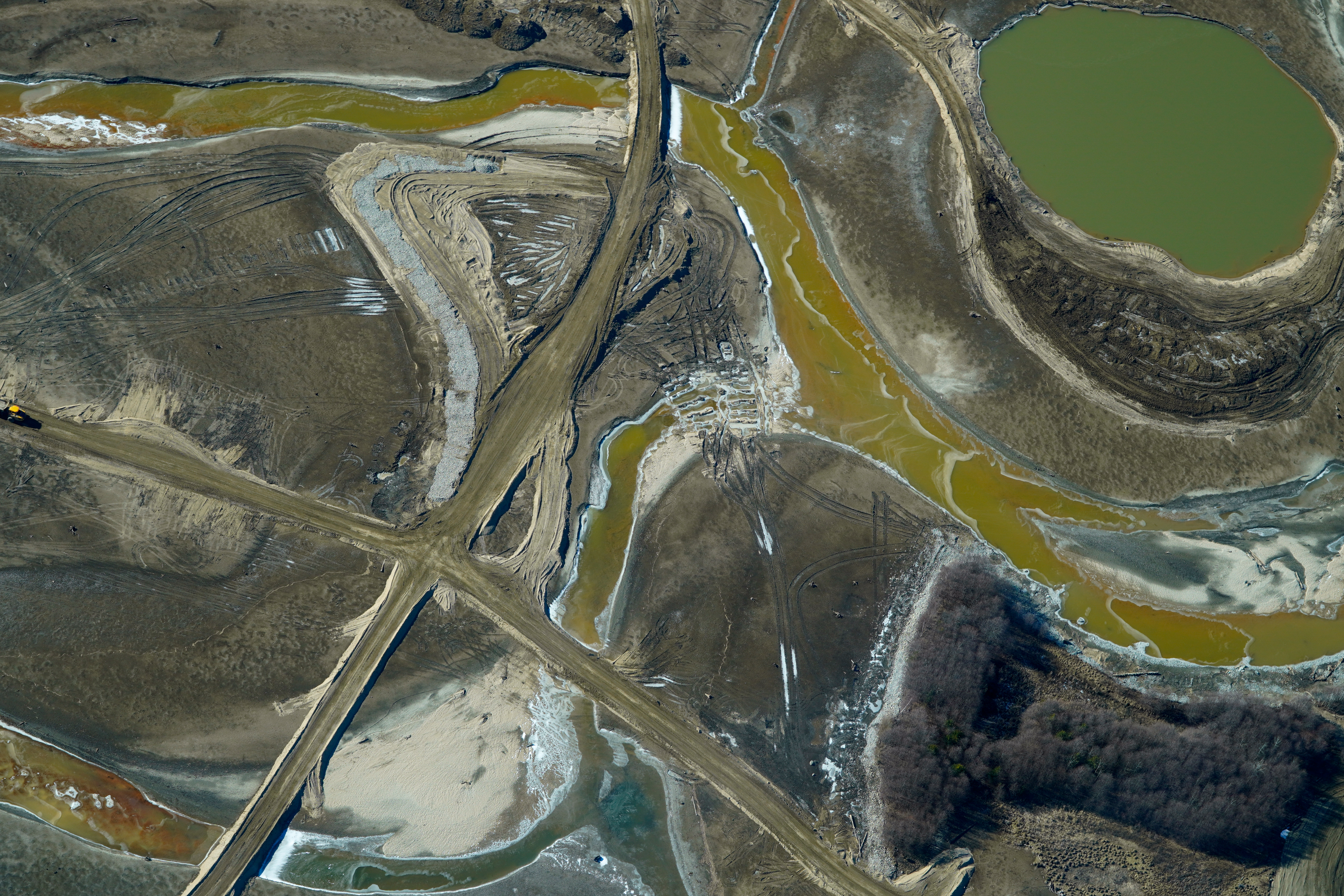 Disturbed soil in water.